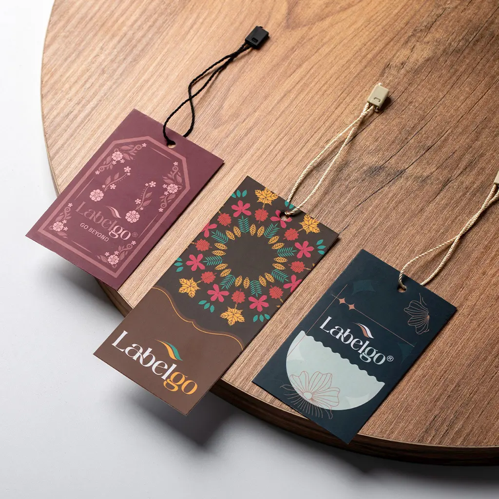 Custom Clothing Labels 39 Kraft hang tags on wooden surface