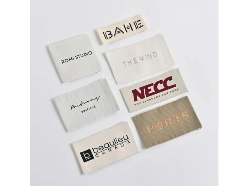 Sew in Labels shown as a textile label manufacturing example with printed fabric label and care label
