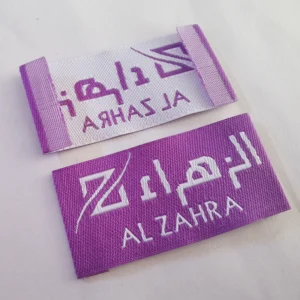 Custom Brand Tags for Clothing shown as a textile label manufacturing example with printed fabric label and care label