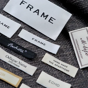 Custom Clothing Brand Labels shown as a textile label manufacturing example with hang tag size label and patch label application
