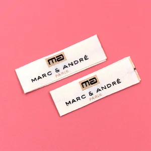 Custom Labels for Fashion Designers shown as a textile label manufacturing example with hang tag size label and patch label application