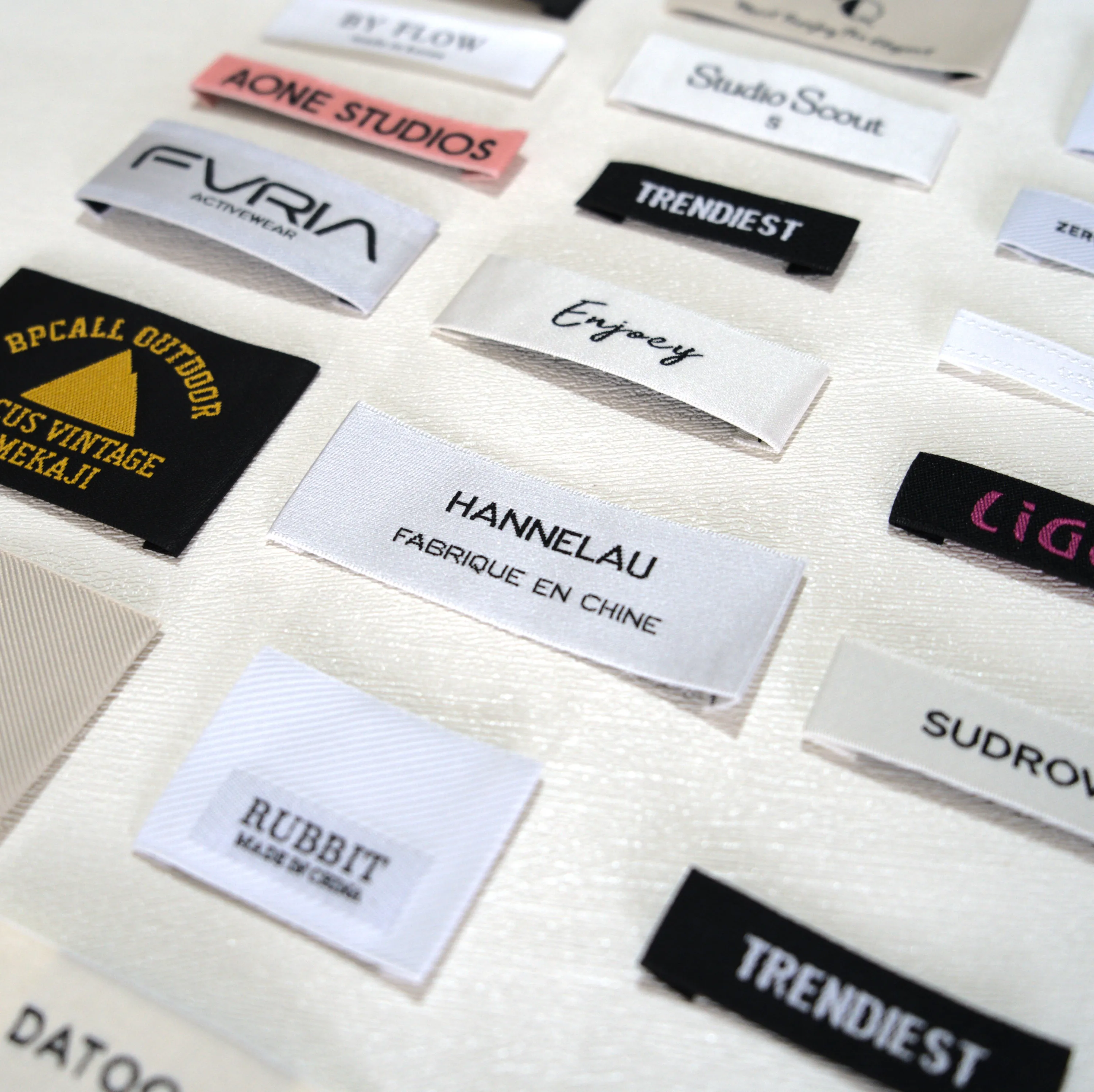 Personalized Clothing Labels shown as a textile label manufacturing example with hang tag size label and patch label application