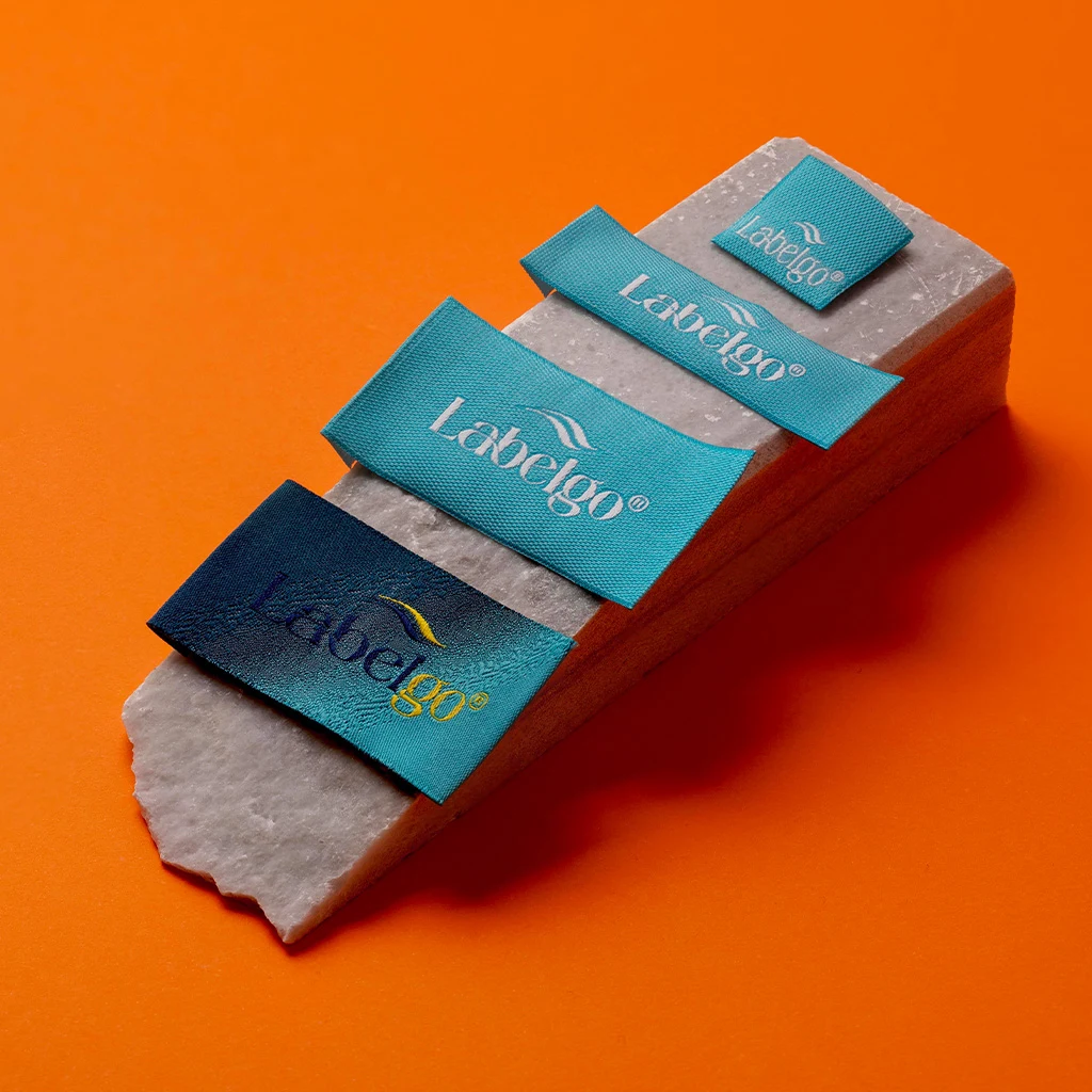 Custom Brand Tags for Clothing shown as a textile label manufacturing example with woven textile label example